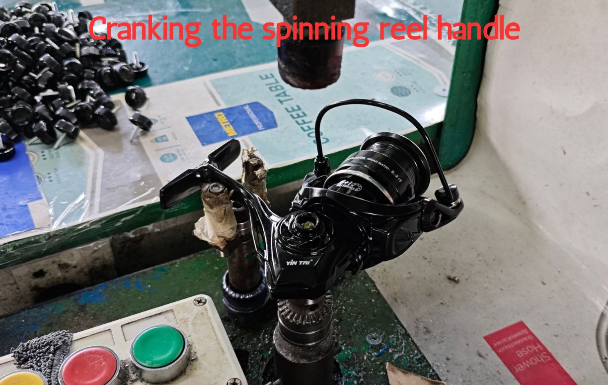 Cranking the spinning reel handle